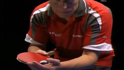 Jan-Ove Waldner in focused stance, preparing to serve with trademark finesse—capturing the quiet intensity and control that defined his table tennis mastery.