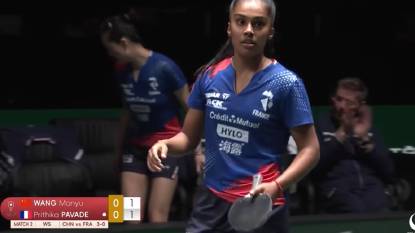 Prithika Pavade prepares to return a shot against Wang Manyu during their match at the ITTF Mixed Team World Cup 2025.